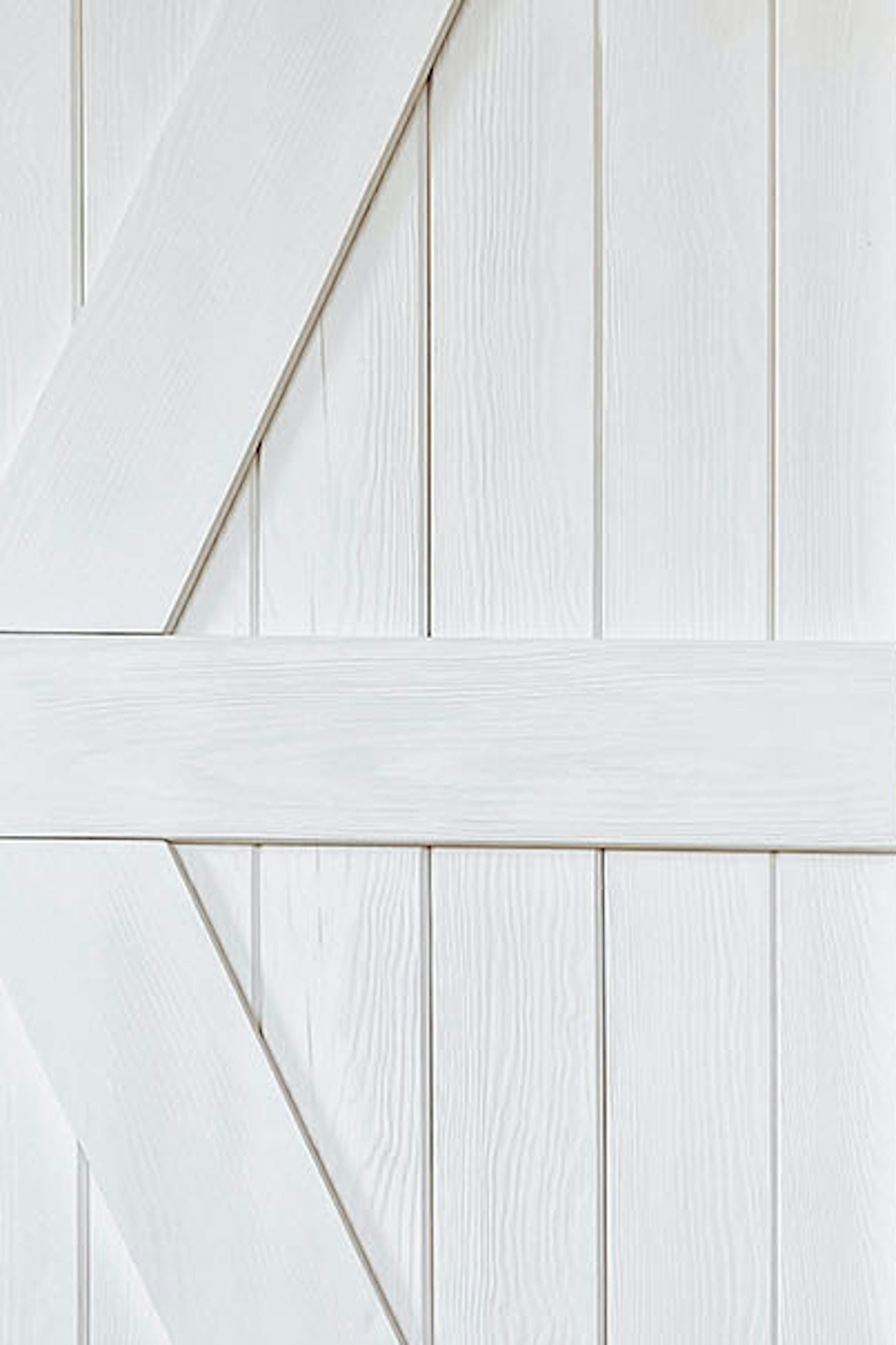 porte coulissante en bois massif blanc