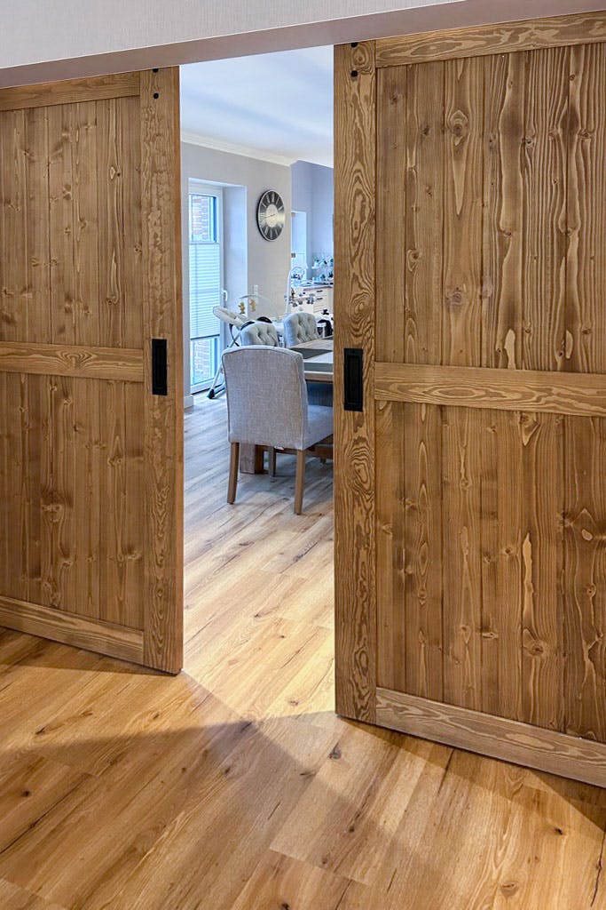 open double doors to the dining room