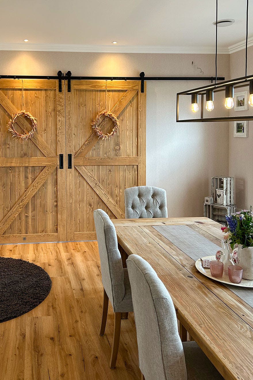 wooden double sliding doors in the dining room