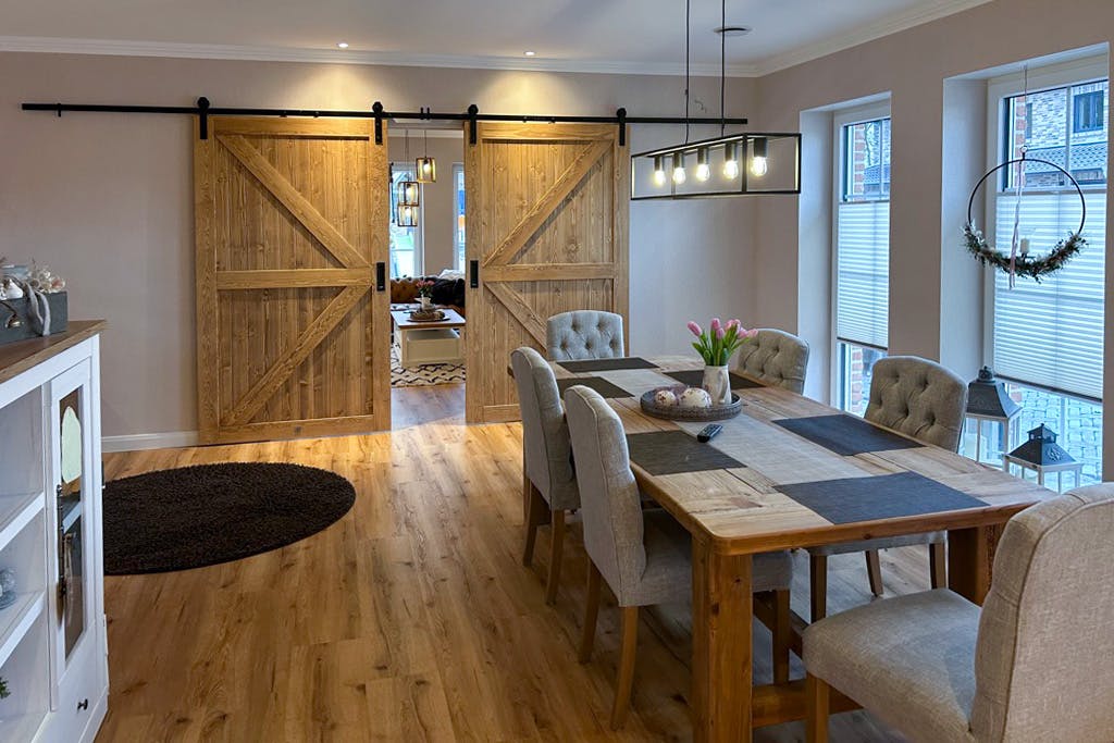 dining room in a classic style with double sliding doors
