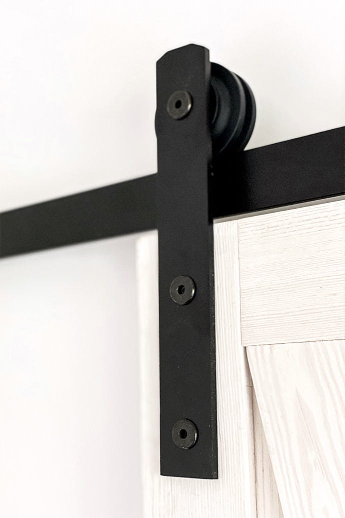 système coulissant noir pour portes coulissantes en bois