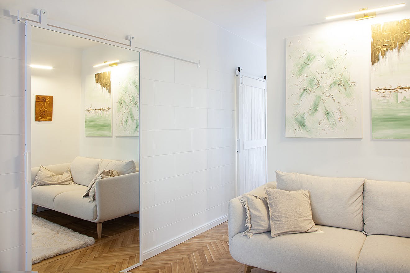 sliding door with a mirror for a dressing room in a small apartment