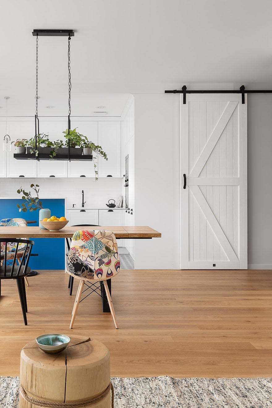 white sliding door to the pantry