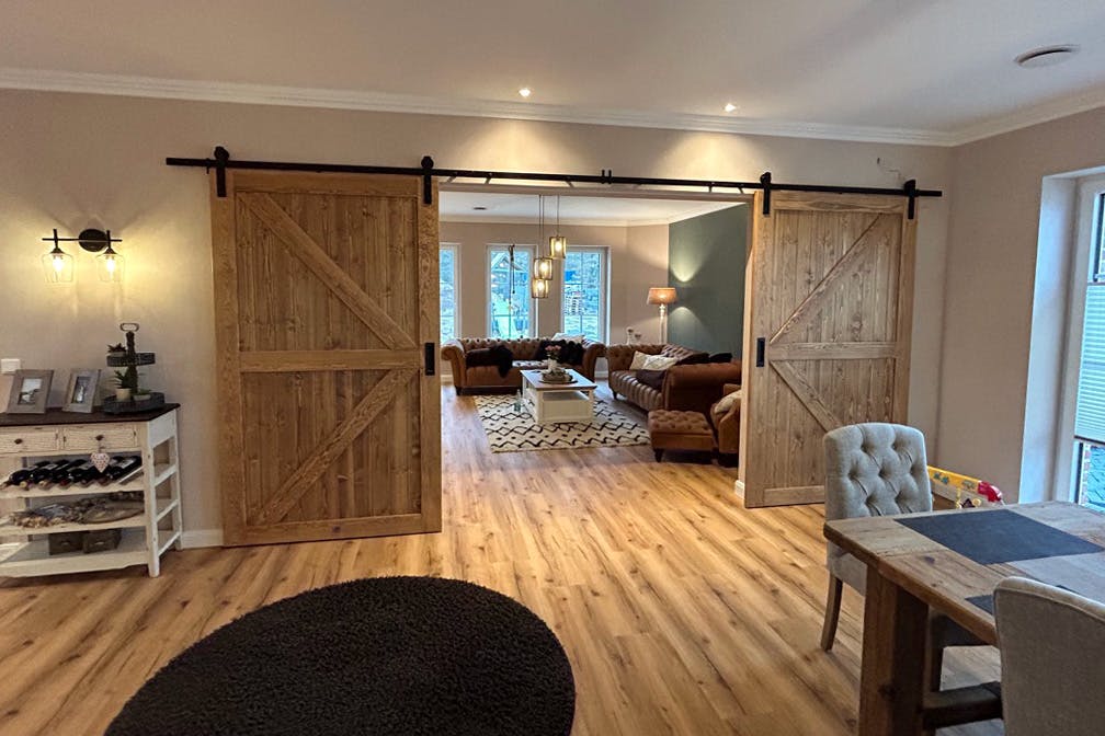 open double sliding door showing the interior of a classic style living room